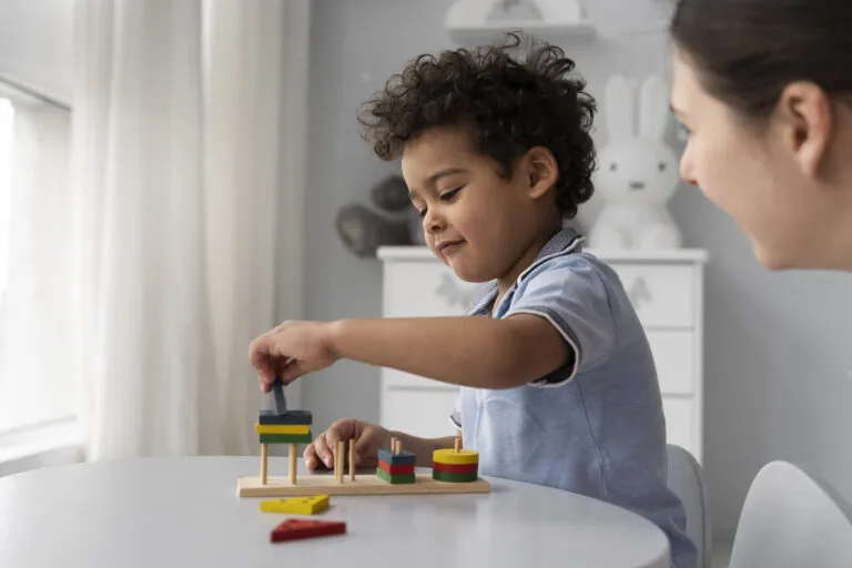 close up child enjoying didactic game